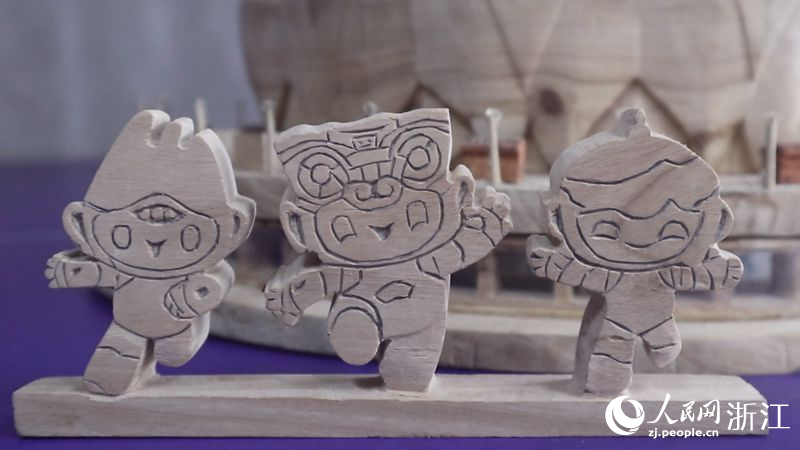 亞運吉祥物木雕。人民網記者 張帆攝