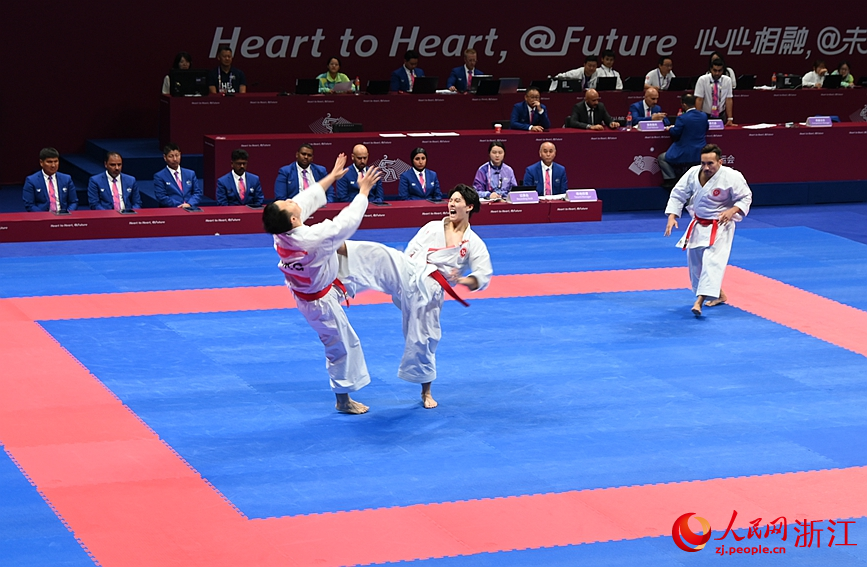 空手道男子團體銅牌賽中的中國香港隊。人民網記者 張麗瑋攝